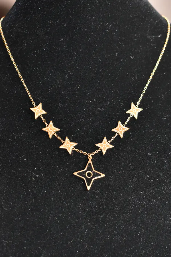 Collier shuriken étoile Or