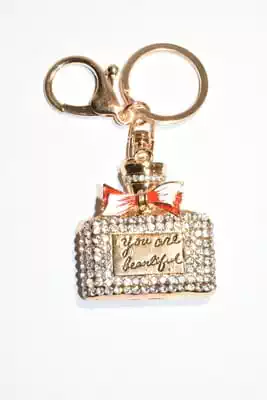 porte-cle flacon de parfum multicolore
