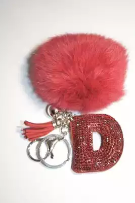 pompon lettre D multicolore